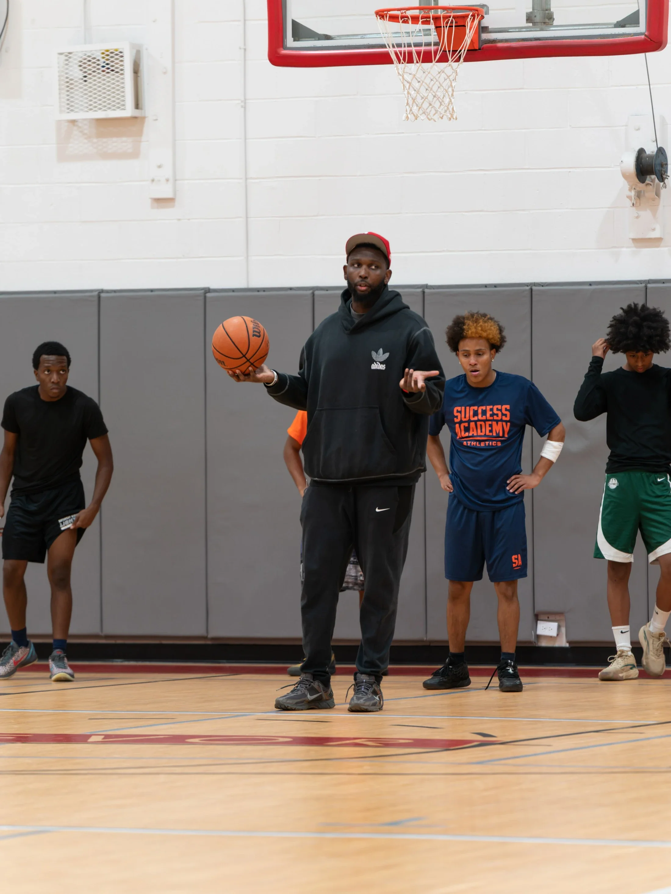 A Pro Reps coach explaining a drill to players